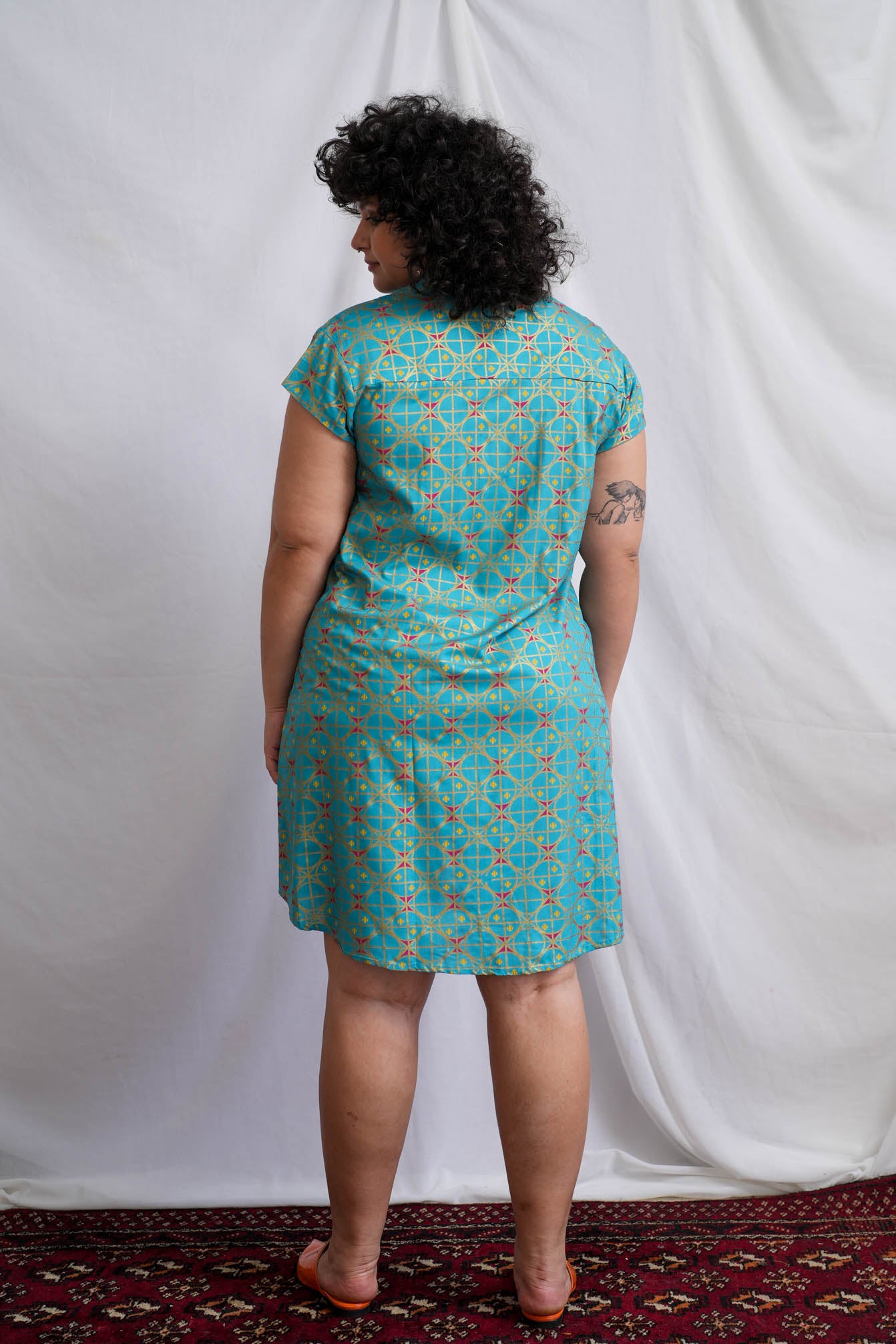 שמלת טוקיו טורקיז מוזהבת