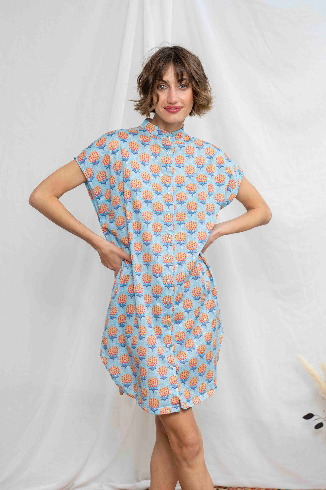 טוניקת מיני אוברסייז פרחים כתומים זהב