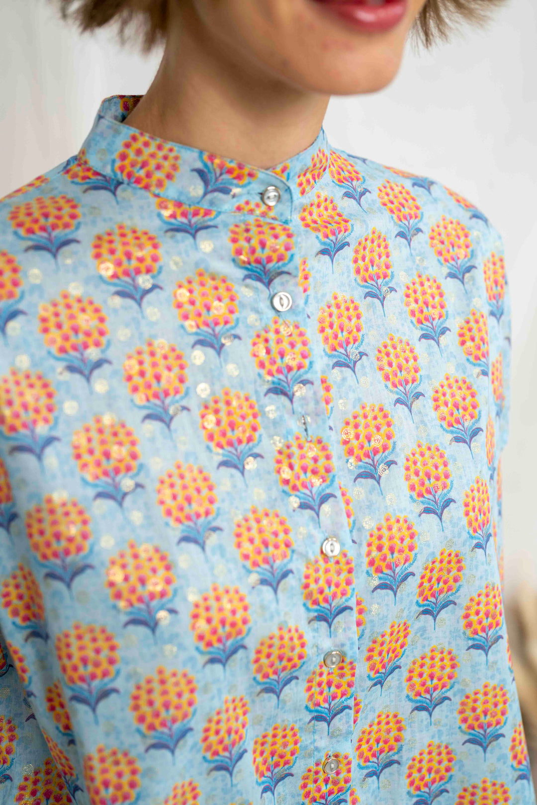 טוניקת מיני אוברסייז פרחים כתומים זהב