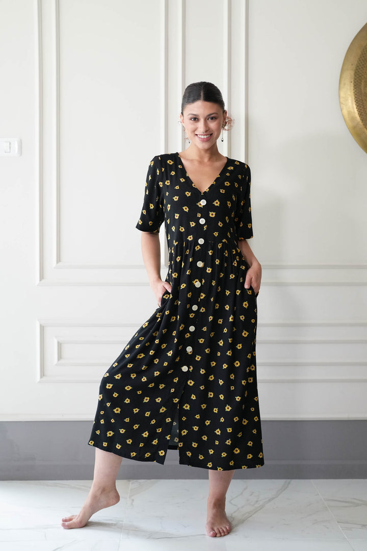 שמלת יולי שרוול חמניות מול השמש