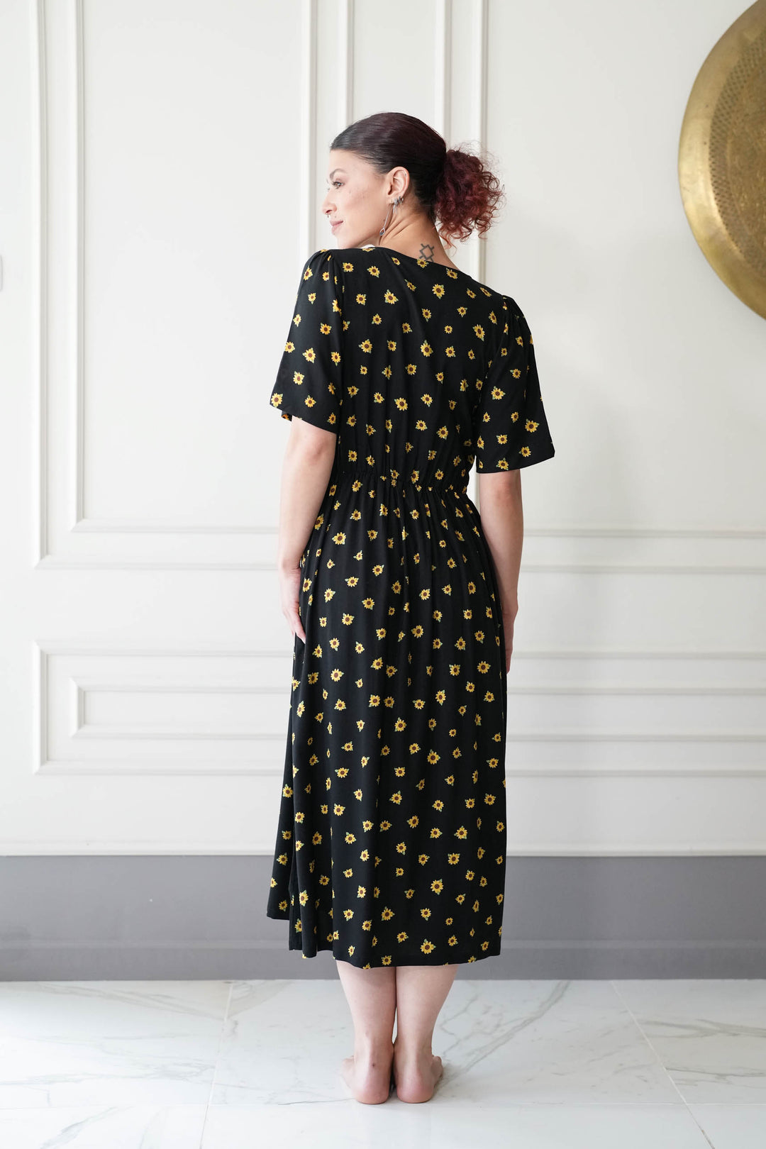 שמלת יולי שרוול חמניות מול השמש